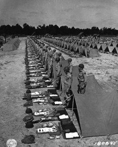 Second Army Tennessee Maneuvers. The Layout. Company F, 347th Inf Reg., 87th Inf. Division, stands by for inspection by the Commanding General, Major General Percy Clarkson. (8 May 43) Signal Corps Photo: 164-007-43-989 (Sgt. J. A. Grant)